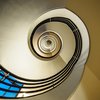 “Spiral staircase – view up”. Image by K. H. Reichert on Flickr under a CC BY-NC licence.